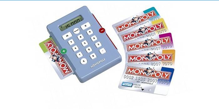 De betaalterminal in het spel Monopoly en bankkaarten