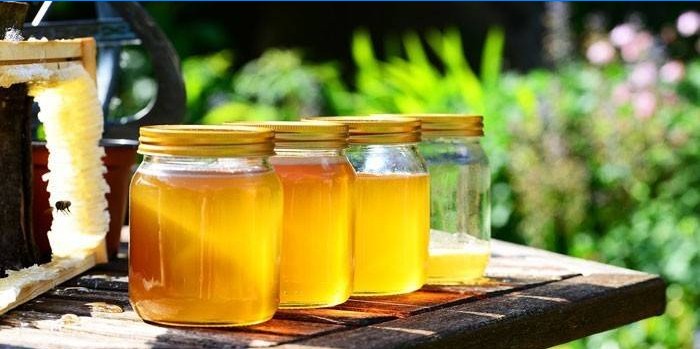 Maneschijn met honing