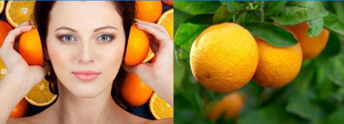 Vrouw houdt sinaasappelen