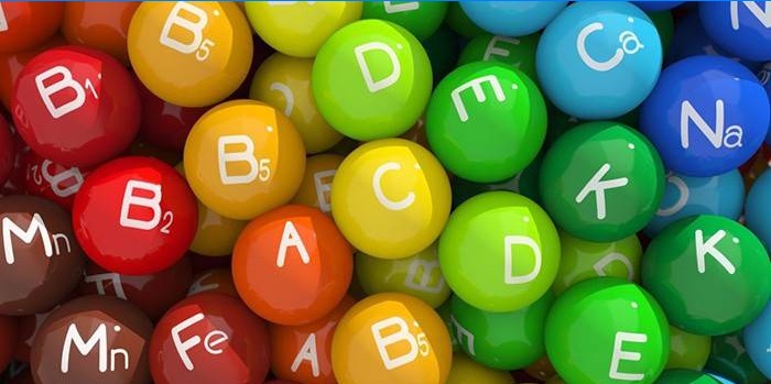 Kleurrijke ballen met vitamines en mineralen pictogrammen