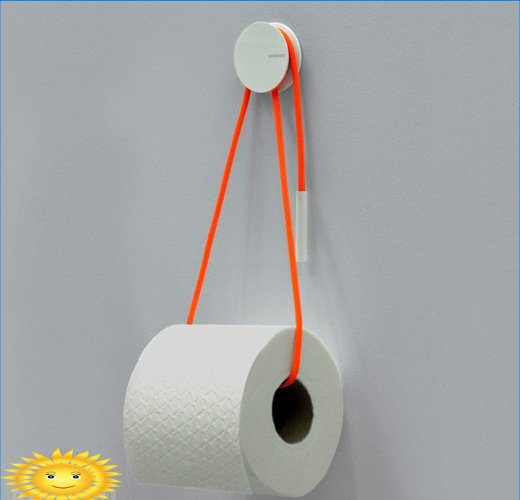 Houder voor toiletpapier in het interieur van de badkamer en toilet