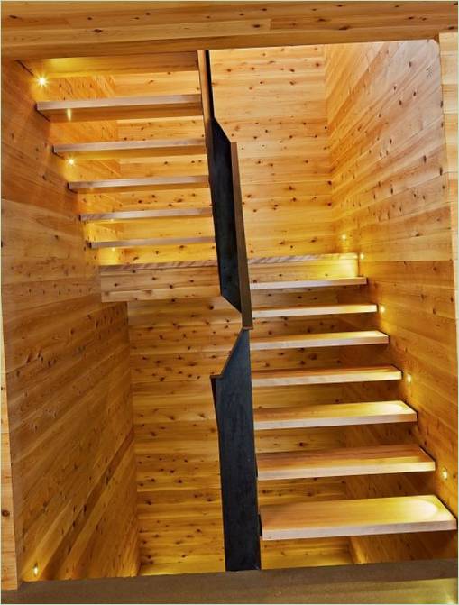 Een houten huis ontwerpen in Quebec City: een trap met verlichte treden