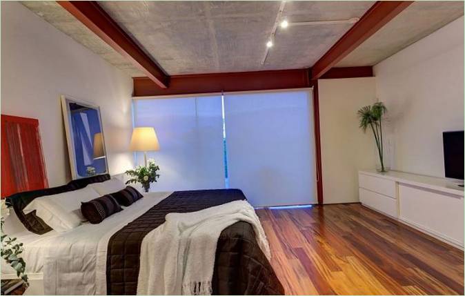 Een gezellige slaapkamer in warme kleuren