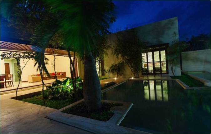 Aldea gezinswoning ontwerp: nachtelijke verlichting van het terras en het zwembad