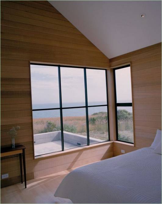 De muren van uw slaapkamer bekleden met natuurlijk hout